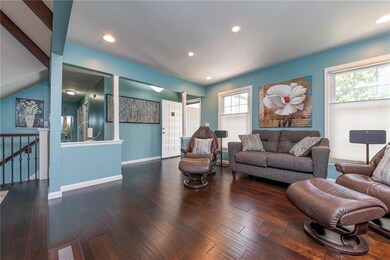 View of Entry, Hall & Stairway to Lower Level from