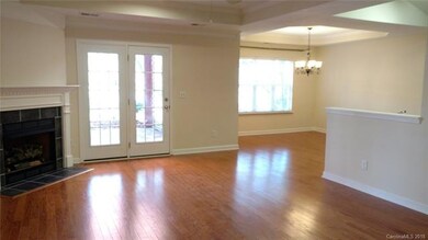 Great Room with Gas Fireplace and access to patio.