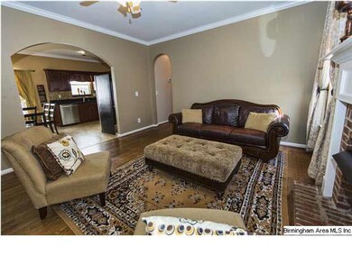 Large den with gas fireplace features lots of spac
