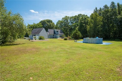 With 1.39 acres of land backing up to the woods, y