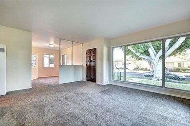 Living room looking to dining area