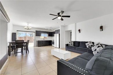 Living area featuring visible vents, track lightin