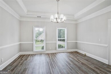 Formal dining room is to your right when entering the home.