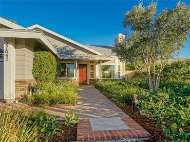 PAVERS FROM THE STREET TO GARAGE AND FRONT ENTRY.