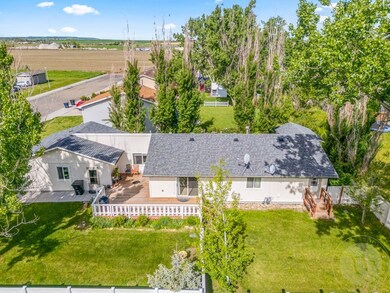 Side of home and yard from overhead