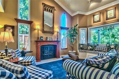 Formal Living Room with custom fireplace and windo