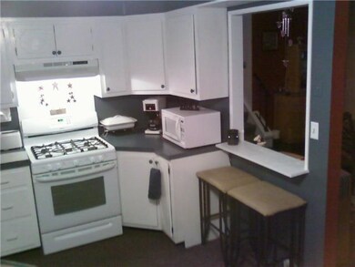Kitchen Open to Dining Room w/Fireplace