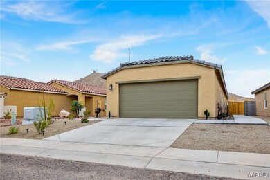 View of front of house featuring stucco siding, dr