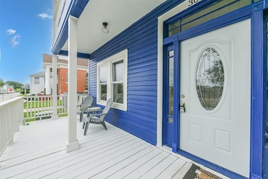 Wide front porch perfect for enjoying the gulf bre