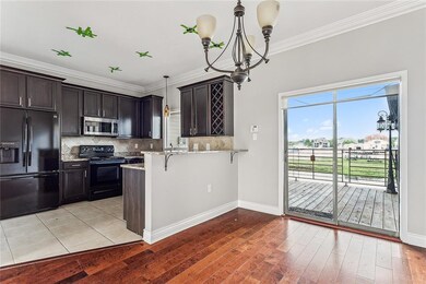 Dinning room and kitchen. Private rear patio overl