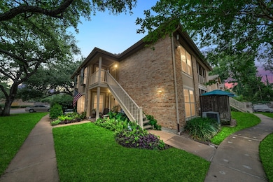 Charming brick exterior surrounded by mature trees and manicured landscaping. Set within a meticulously maintained community, residents enjoy two pools and lush common areas a rare find among Houston condos.