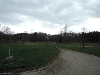 Back of 13.4 acres. Beautiful setting.