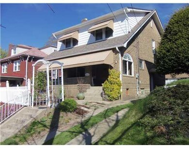 Exterior Front. Many charming windows throughout t