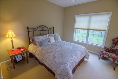 Bedroom 2. Light filled with adjacent full bathroom.