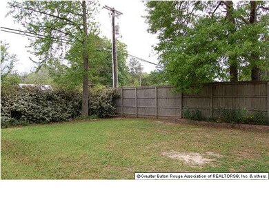 Large backyard, with landscaping and 8' privacy fe