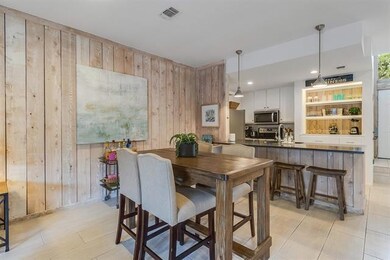 Dining space with wooden walls