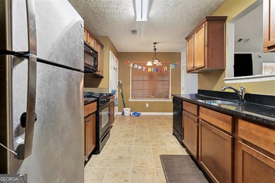 2766 Topaz Rd, Riverdale, GA 30296 - photo 7