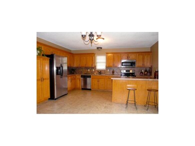 Amazing kitchen!  Tile floor, backsplash and count