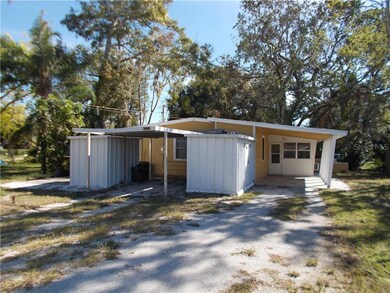 Alley access and two carports
