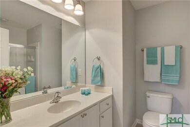 Master bathroom with upgraded lighting and new pai