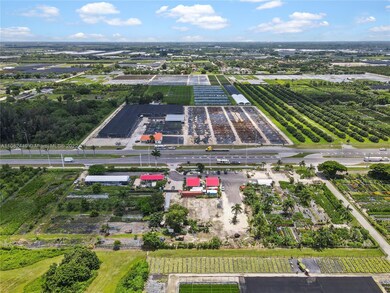 REAR VIEW AERIAL 4.5 ACRES (3 BUILDABLE FOLIO'S) 6