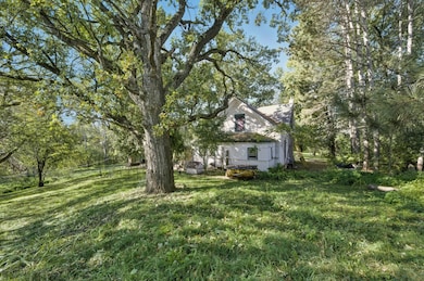 Beautiful setting to restore this dwelling or demo and build your dream home.