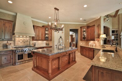 Incredible Chef's Kitchen with Island and Breakfast Bar