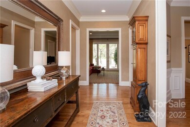 Long and elegant entryway with hardwood floors throughout.  