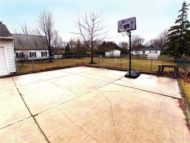 Exterior Front 2 Car Wide driveway looking into ba