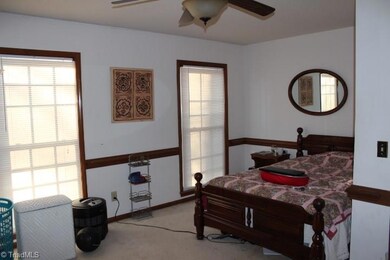 Downstairs bedroom and full bath could be used as master.