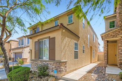 View of front facade with stone siding and stucco
