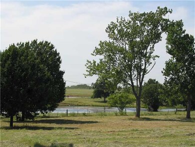 Land. Nice view of neighbor s pond on the west.