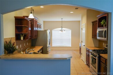GREAT shot from living room into kitchen. Note the
