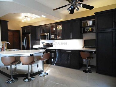 Property Photo. Kitchen has upgraded custom cabine