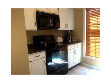 Kitchen. Updated kitchen with stylish white cabine