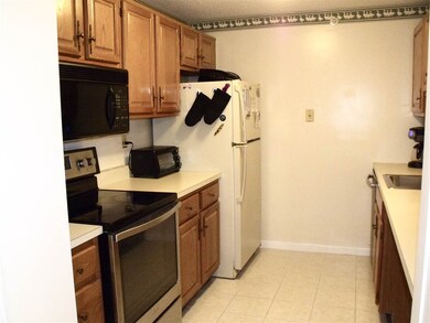 11 Bartemus Trail unit U208, Nashua, NH 03063 - photo 3