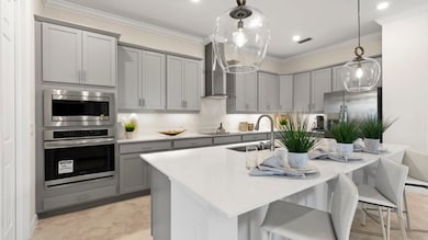 This modern kitchen features a center island ideal for casual dining or entertaining, stunning grani