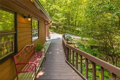 This home is surrounded by a lush, green lot.