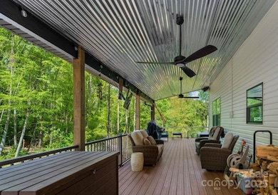 Porch has metal roof, electric and gas feed on north side.