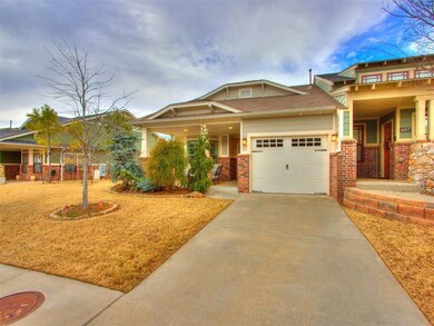 Craftsman house featuring a garage and a porch