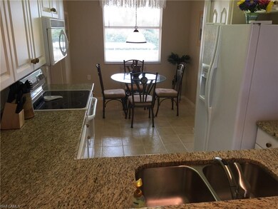 Roomy and bright eat in kitchen.