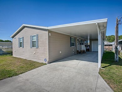 Two Vehicle Carport with Golf Cart Garage