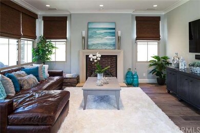 Enjoy your gas fireplace, custom Roman shades, and