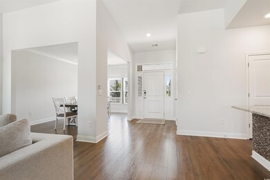 Foyer featuring dark hardwood / wood-style floorin
