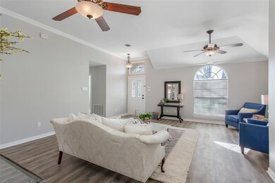 Hallway leads to 3 split bedrooms, full secondary 