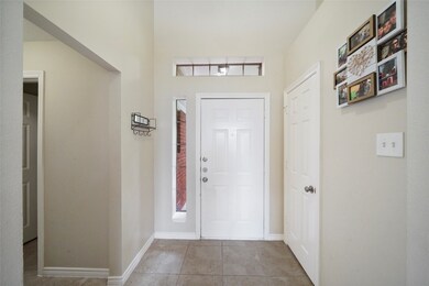 Step inside to find a fabulous open floor plan with a fresh neutral color pallet with tile floors, neutral paint, soaring ceilings and fantastic natural light.