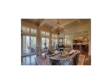 Wall to wall windows with access to covered deck.