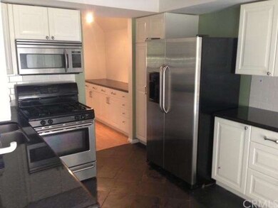 Kitchen with stainless steel appliances and granit