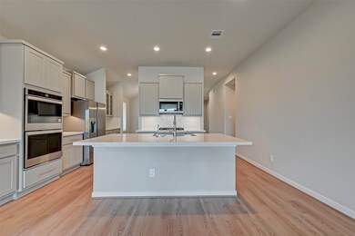 Beautiful Kitchen open to Living Room