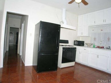 Kitchen with gas range/oven.